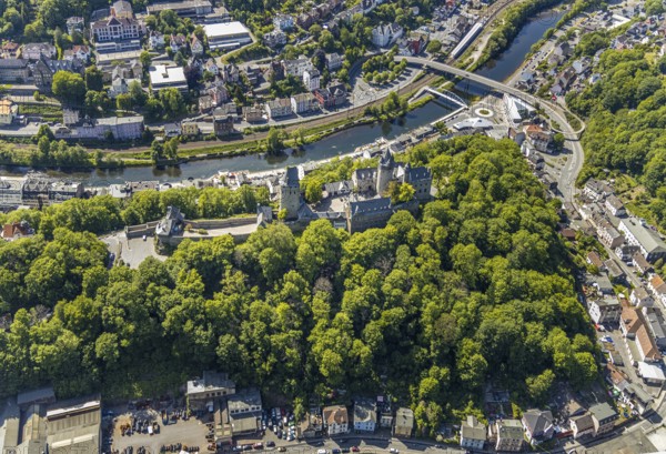 Aerial view, Burg Altena, Fritz-Thomee-Straße, River Lenne, Altena Town Hall, Altena, Sauerland, Märkischer Kreis, North Rhine-Westphalia, Germany, architectural monument, authority, bridge, castle, Burggymnasium Altena, castle courtyard, castle ruins, DE, DJH, Europe, pedestrian bridge over the Lenne, gastronomy, green trees, Altena Castle Youth Hostel, Lenneuferstraße, aerial view, aerial photography, aerial photography, Obere Lenneterasse, promenade, castle, school, sight, overview, defence system, bird's eye view, birds-eyes view, overview