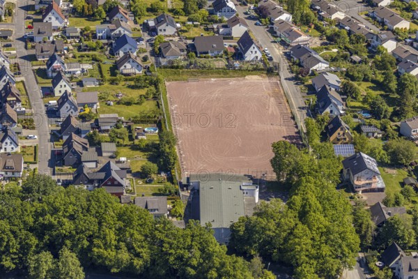 Aerial view, residential area Niedereimer, sports field Niedereimer, cemetery Niedereimer, Arnsberg, Sauerland, Hochsauerlandkreis, North Rhine-Westphalia, Germany, DE, Europe, property tax, real estate, aerial view, aerial photography, aerial photography, overview, bird's-eye view, residential area, living and living, residential area, residential buildings, residential quality, residential neighbourhood, housing estate, birds-eyes view, overview