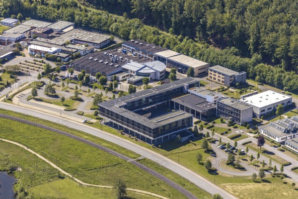 Aerial view, industrial estate Altes Feld, vocational training centre Arnsberg, Caritas workshops Arnsberg, Arnsberg, Sauerland, Hochsauerlandkreis, North Rhine-Westphalia, Germany, DE, Europe, river Ruhr, aerial view, aerial photography, aerial photography, Ruhraue, overview, bird's-eye view, overview