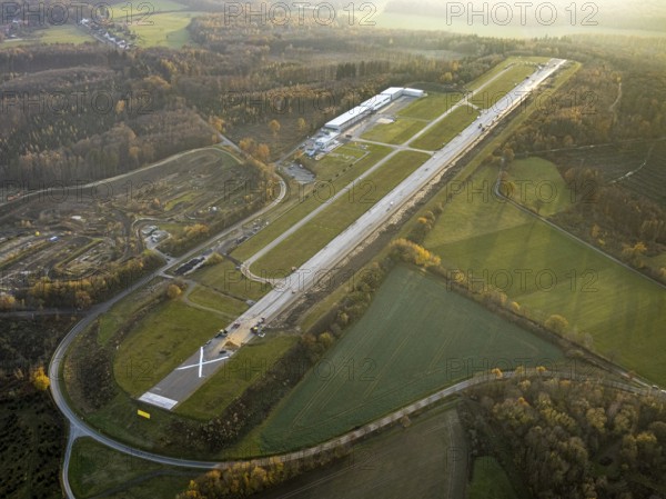 Aerial photo, Arnsberg Menden airfield, Arnsberg airfield gets a new runway, EDLA, Voßwinkel, Arnsberg, Sauerland, North Rhine-Westphalia, Germany, DE, Europe, birds-eyes view, aerial photo, aerial photography, aerial photography, overview, bird's eye view, commercial airfield, construction work on the runway, runway