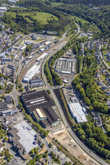 Aerial view, Attendorn railway station, commercial area, Greif site, Hanse Hotel, Attendorn, Sauerland, North Rhine-Westphalia, Germany, ABEX SCHEDLER HAUSTECHNIK, DE, entrance to Attahöhle, Europe, gastronomy, commercial enterprises, commercial area, commercial location, commercial use, hotel, hotel facilities, hotel business, industrial area, industrial location, aerial photograph, aerial photography, aerial photography, overview, bird's-eye view, birds-eyes view, overview