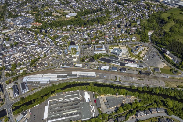 Aerial view, townscape, railway station Attendorn, entrance Attahöhle, Hanse Hotel, Attendorn, Sauerland, North Rhine-Westphalia, Germany, Attahöhle, railway station, DE, Deutsche Bahn AG, shopping centre Finnentroper Straße, Europe, distant view, gastronomy, HANSE HOTEL Attendorn, hotel, hotel facilities, hotel business, city centre, aerial view, aerial photography, aerial photography, view of a place, sight, city area, overview, bird's eye view, birds-eyes view, overview