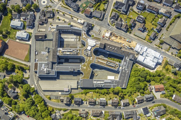 Aerial view, Viega Attendorn Campus, construction site Viega car park on Windhauser Straße, Attendorn, Sauerland, North Rhine-Westphalia, Germany, DE, Europe, commercial enterprises, commercial area, commercial site, commercial use, heating technology, industrial site, roundabout, aerial view, aerial photography, aerial photography, sanitary engineering, overview, Viega Platz, bird's-eye view, bird's-eye view, overview