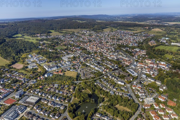 Aerial view, town centre, catholic church St. Peter and Paul, Bad Driburg, East Westphalia-Lippe, North Rhine-Westphalia, Germany, place of worship, city, DE, Europe, religious community, place of worship, property tax, holy place, real estate, city centre, church, parish, denomination, aerial view, aerial photography, aerial photography, OLWBUCH, OWL, OWL-Buch, local view, East Westphalia, religion, religious site, townscape, urban area, city centre, overview, bird's-eye view, residential area, living and life, residential area, residential buildings, residential quality, residential quarter, housing estate, birds-eyes view, overview