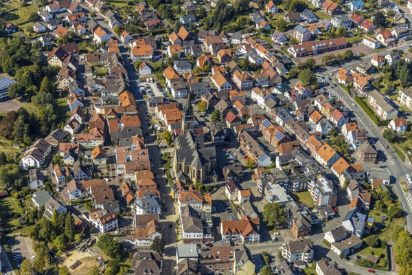 Aerial view, town centre, catholic church St. Peter and Paul, Bad Driburg, East Westphalia-Lippe, North Rhine-Westphalia, Germany, place of worship, city, DE, Europe, religious community, place of worship, property tax, holy place, real estate, city centre, church, parish, denomination, aerial view, aerial photography, aerial photography, OLWBUCH, OWL, OWL-Buch, local view, East Westphalia, religion, religious site, townscape, urban area, city centre, overview, bird's-eye view, residential area, living and life, residential area, residential buildings, residential quality, residential quarter, housing estate, birds-eyes view, overview