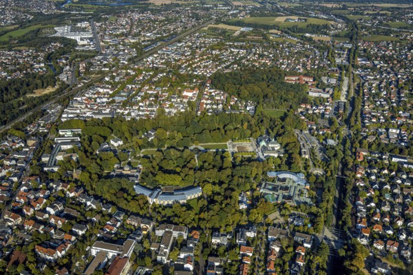 Aerial view, spa garden with Wandelhalle, Klinik am Rosengarten, Bali Therme, GOP Varieté Theatre Kaiserpalais, fountain in the spa garden, water fountain field on the Kurhausplatz, Bad Oeynhausen, Ostwestfalen-Lippe, North Rhine-Westphalia, Germany, DE, Europe, health care, hospital, Im Kurgarten, clinic, Klinik Porta Westfalica, clinic, hospital, culture, art, spa garden, aerial view, aerial photography, aerial photography, medical facility, medical assistance, emergency service, OLWBUCH, OWL, OWL-Buch, Oeynhauser Schweiz, Ostwestfalen, park, theatre, senior citizens' residence Weserstraße, spa, theatre, thermal baths, overview, events, event location, bird's-eye view, wellness, birds-eyes view, cultural use, overview, medical care
