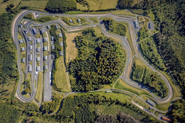 Aerial view, Bilster Berg race track, paddock, racing cars, Pömbsen, Bad Driburg, East Westphalia-Lippe, North Rhine-Westphalia, Germany, racetrack, Bilster Berg, pit halls, DE, Europe, aerial view, aerial photography, aerial photography, motorsport, OLWBUCH, OWL, OWL-Buch, East Westphalia, racing, race track, circuit, overview, bird's-eye view, forest area, birds-eyes view, overview