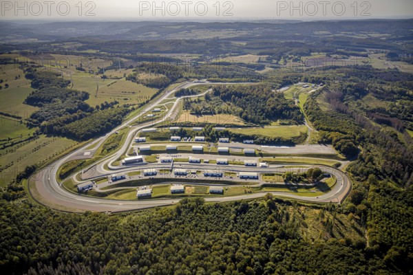 Aerial view, Bilster Berg race track, paddock, racing cars, Pömbsen, Bad Driburg, East Westphalia-Lippe, North Rhine-Westphalia, Germany, racetrack, Bilster Berg, pit halls, DE, Europe, aerial view, aerial photography, aerial photography, motorsport, OLWBUCH, OWL, OWL-Buch, East Westphalia, racing, race track, circuit, overview, bird's-eye view, forest area, birds-eyes view, overview