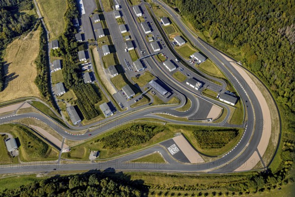 Aerial view, Bilster Berg race track, paddock, racing cars, Pömbsen, Bad Driburg, East Westphalia-Lippe, North Rhine-Westphalia, Germany, racetrack, Bilster Berg, pit halls, DE, Europe, aerial view, aerial photography, aerial photography, motorsport, OLWBUCH, OWL, OWL-Buch, East Westphalia, racing, race track, circuit, overview, bird's-eye view, forest area, birds-eyes view, overview