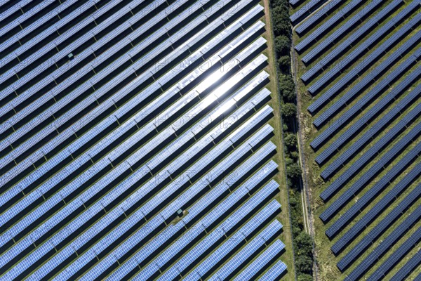 Aerial view, solar park, at the federal road B64, Herste, Bad Driburg, Ostwestfalen-Lippe, North Rhine-Westphalia, Germany, DE, Europe, shapes and colours, open space photovoltaic plant, aerial view, aerial photography, aerial photography, OLWBUCH, OWL, OWL-Buch, Ostwestfalen, photovoltaic, photovoltaic system, solar, solar system, solar energy, solar power plant, solar energy, overview, bird's-eye view, birds-eyes view, overview, alternative energy, renewable energy, solar panel