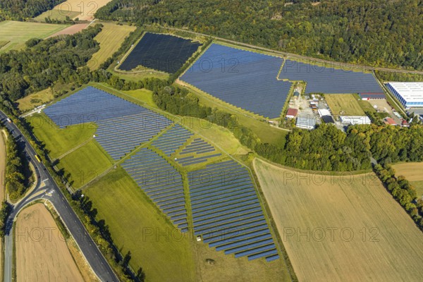 Aerial view, solar park, at the federal road B64, Herste, Bad Driburg, Ostwestfalen-Lippe, North Rhine-Westphalia, Germany, DE, Europe, shapes and colours, open space photovoltaic plant, aerial view, aerial photography, aerial photography, OLWBUCH, OWL, OWL-Buch, Ostwestfalen, photovoltaic, photovoltaic system, solar, solar system, solar energy, solar power plant, solar energy, overview, bird's-eye view, birds-eyes view, overview, alternative energy, renewable energy, solar panel