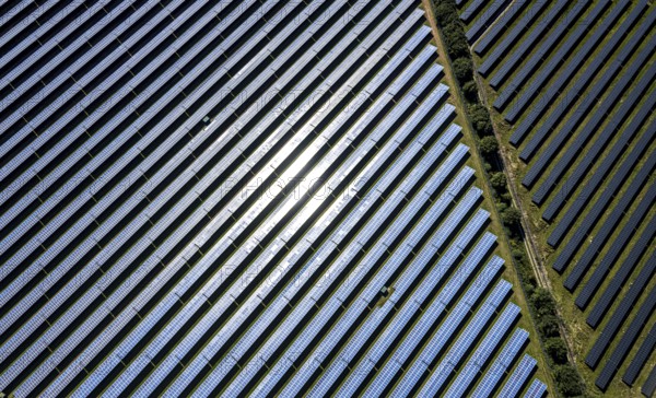 Aerial view, solar park, at the federal road B64, Herste, Bad Driburg, Ostwestfalen-Lippe, North Rhine-Westphalia, Germany, DE, Europe, shapes and colours, open space photovoltaic plant, aerial view, aerial photography, aerial photography, OLWBUCH, OWL, OWL-Buch, Ostwestfalen, photovoltaic, photovoltaic system, solar, solar system, solar energy, solar power plant, solar energy, overview, bird's-eye view, birds-eyes view, overview, alternative energy, renewable energy, solar panel