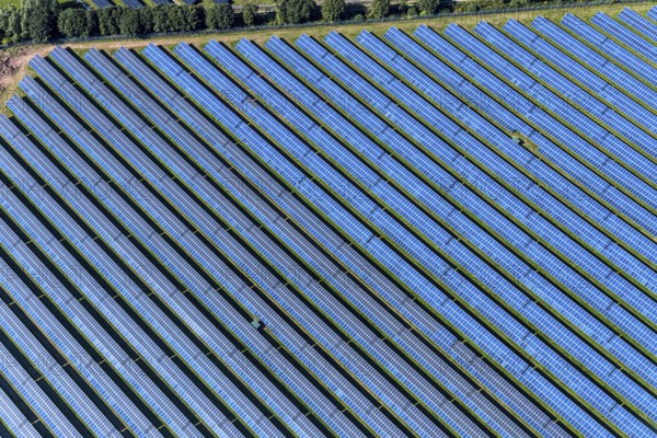 Aerial view, solar park, at the federal road B64, Herste, Bad Driburg, Ostwestfalen-Lippe, North Rhine-Westphalia, Germany, DE, Europe, shapes and colours, open space photovoltaic plant, aerial view, aerial photography, aerial photography, OLWBUCH, OWL, OWL-Buch, Ostwestfalen, photovoltaic, photovoltaic system, solar, solar system, solar energy, solar power plant, solar energy, overview, bird's-eye view, birds-eyes view, overview, alternative energy, renewable energy, solar panel