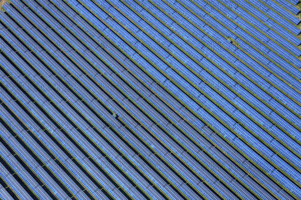 Aerial view, solar park, at the federal road B64, Herste, Bad Driburg, Ostwestfalen-Lippe, North Rhine-Westphalia, Germany, DE, Europe, shapes and colours, open space photovoltaic plant, aerial view, aerial photography, aerial photography, OLWBUCH, OWL, OWL-Buch, Ostwestfalen, photovoltaic, photovoltaic system, solar, solar system, solar energy, solar power plant, solar energy, overview, bird's-eye view, birds-eyes view, overview, alternative energy, renewable energy, solar panel