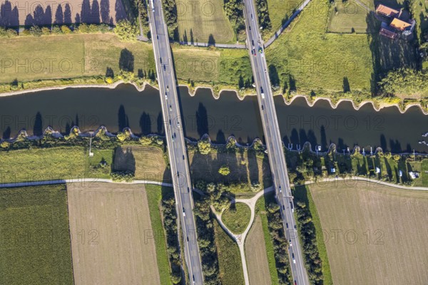Aerial view, motorway A2, motorway bridges, river Weser, Weser bridge, Holtrup, Bad Oeynhausen, East Westphalia-Lippe, North Rhine-Westphalia, Germany, 2 bridges over the Weser, motorway, bridge, DE, Europe, shapes and colours, aerial view, aerial photography, aerial photography, OLWBUCH, OWL, OWL book, East Westphalia, overview, Unterloh, bird's-eye view, meadows and fields, birds-eyes view, overview