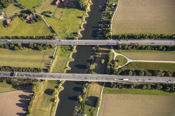 Aerial view, motorway A2, motorway bridges, river Weser, Weser bridge, Holtrup, Bad Oeynhausen, East Westphalia-Lippe, North Rhine-Westphalia, Germany, 2 bridges over the Weser, motorway, bridge, DE, Europe, shapes and colours, aerial view, aerial photography, aerial photography, OLWBUCH, OWL, OWL book, East Westphalia, overview, Unterloh, bird's-eye view, meadows and fields, birds-eyes view, overview