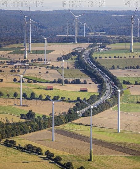 Aerial view, wind turbines, motorway A44, motorway service area Sintfeld, Wewelsburg, Büren, Ostwestfalen-Lippe, North Rhine-Westphalia, Germany, motorway service area, Bad Wünnenberg, DE, energy, energy industry, Europe, distant view, aerial view, aerial photography, aerial photography, OLWBUCH, OWL, OWL-Buch, Ostwestfalen, electricity, overview, bird's-eye view, WEA, meadows and fields, wind energy, wind energy plant, wind farm, wind power, wind power plant, wind park, birds-eyes view, overview