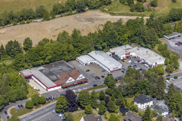 Aerial view, retail mile, shopping street Hönnetalstraße, Bundesstraße 229, Balve, Sauerland, North Rhine-Westphalia, Germany, DE, shopping, shopping mall, shopping mile, shopping markets, shopping place, shopping street, shopping centre, Europe, aerial view, aerial photography, aerial photography, local supply centre, overview, bird's-eye view, overview