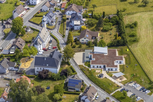 Aerial view, local view district Beckum, catholic church St. Nikolaus, kindergarten Nikolausstraße, Balve, Sauerland, North Rhine-Westphalia, Germany, place of worship, DE, Europe, religious community, place of worship, property tax, real estate, kindergarten, day nursery, day care centre, church, church community, day care centre, denomination, aerial view, aerial photography, aerial photography, overview, bird's eye view, living and life, residential area, residential buildings, residential quality, housing estate, birds-eyes view, overview