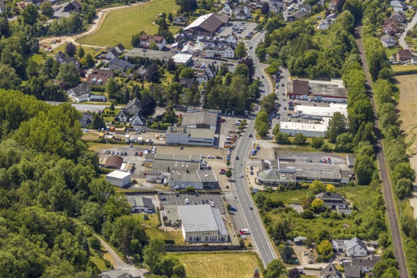 Aerial view, retail mile, shopping street Hönnetalstraße, Bundesstraße 229, Balve, Sauerland, North Rhine-Westphalia, Germany, DE, shopping, shopping mall, shopping mile, shopping markets, shopping place, shopping street, shopping centre, Europe, aerial view, aerial photography, aerial photography, local supply centre, overview, bird's-eye view, overview