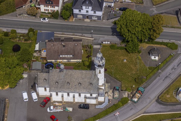 Aerial view, St. Nicholas Catholic Church, Beckum, Balve, Sauerland, North Rhine-Westphalia, Germany, place of worship, DE, Europe, religious community, place of worship, property tax, real estate, church, parish, denomination, aerial photograph, aerial photography, aerial photography, overview, bird's-eye view, living and life, residential area, residential buildings, quality of life, housing estate, birds-eyes view, overview