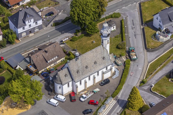Aerial view, St. Nicholas Catholic Church, Beckum, Balve, Sauerland, North Rhine-Westphalia, Germany, place of worship, DE, Europe, religious community, place of worship, property tax, real estate, church, parish, denomination, aerial photograph, aerial photography, aerial photography, overview, bird's-eye view, living and life, residential area, residential buildings, quality of life, housing estate, birds-eyes view, overview