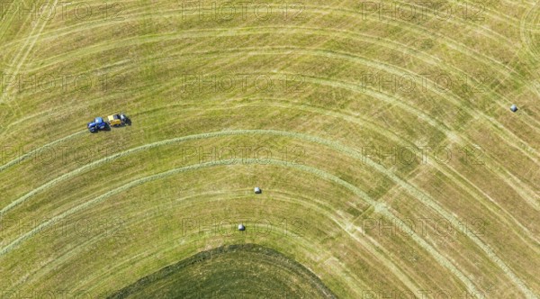 Aerial view, agricultural fields, tractor mowing meadow, Langenholthausen, Balve, Sauerland, North Rhine-Westphalia, Germany, DE, Europe, shapes and colours, agriculture, aerial view, aerial photography, aerial photography, overview, bird's-eye view, meadows and fields, birds-eyes view, overview