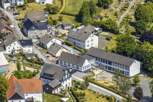Aerial photograph, SoKoLa.de, former städt. Gemeinschaftsgrundschule Langenholthausen, Balve, Sauerland, North Rhine-Westphalia, Germany, DE, Europe, aerial view, aerial photography, aerial photography, school, overview, events, venue, event centre, bird's-eye view, birds-eyes view, cultural use, overview, Langenholthausen