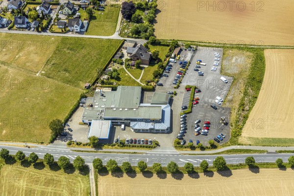 Aerial view, Opel Autohaus Carl Bichmann, Aral petrol station, Balve, Sauerland, North Rhine-Westphalia, Germany, DE, Europe, commercial enterprises, commercial area, commercial location, commercial use, aerial photograph, aerial photography, aerial photography, car parks, overview, bird's-eye view, birds-eyes view, overview, Langenholthausen