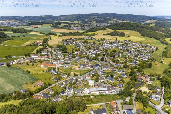 Aerial view, view of Langenholthausen, Goldbäckerei Grote GmbH, Sunderner Straße, St. Johannes Kirche Langenholthausen, Balve, Sauerland, North Rhine-Westphalia, Germany, place of worship, DE, Europe, commercial enterprises, commercial area, commercial location, commercial use, religious community, place of worship, Grote bakery, church, parish, denomination, aerial view, aerial photography, aerial photography, overview, bird's-eye view, birds-eyes view, overview, Langenholthausen