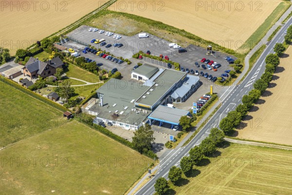 Aerial view, Opel Autohaus Carl Bichmann, Aral petrol station, Balve, Sauerland, North Rhine-Westphalia, Germany, DE, Europe, commercial enterprises, commercial area, commercial location, commercial use, aerial photograph, aerial photography, aerial photography, car parks, overview, bird's-eye view, birds-eyes view, overview, Langenholthausen