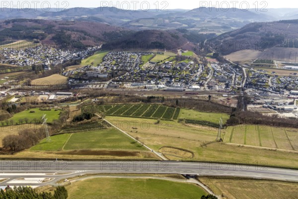 Aerial view, motorway A46 rest area Nuttlar, with view of Bestwig, Bestwig, North Rhine-Westphalia, Germany, motorway A46 extension, railway station, Bestwig Hbf, DE, Europe, shapes and colours, hilly landscape, aerial view, aerial photography, aerial photography, rest area, Sauerland, overview, bird's-eye view, forest area, birds-eyes view, overview