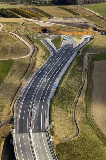 Aerial view, valley bridge Nuttlar, motorway A46, view of Nuttlar, junction B480n, hilly landscape, Bestwig, North Rhine-Westphalia, Germany, motorway A46 extension, motorway bridge, bridge, federal road B480n, DE, Europe, roundabout, aerial view, aerial photography, aerial photography, Nuttlar, Rüthener Straße, Sauerland, valley bridge, overview, bird's-eye view, forest area, birds-eyes view, overview
