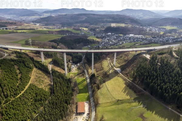Aerial view, valley bridge Nuttlar, motorway A46, local view Nuttlar, hilly landscape, Bestwig, North Rhine-Westphalia, Germany, motorway A46 extension, motorway bridge, bridge, DE, Europe, aerial view, aerial photography, aerial photography, Rüthener Straße, Sauerland, valley bridge, overview, bird's-eye view, forest area, birds-eyes view, overview