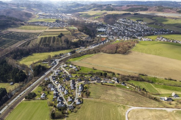 Aerial view, local view Dümel, federal road B7, slag heap former mine Ostwig, local view Nuttlar, Bestwig, North Rhine-Westphalia, Germany, motorway A46 extension, visitor mine slate mine Nuttlar, DE, Europe, property tax, real estate, aerial view, aerial photography, aerial photography, Sauerland, overview, bird's-eye view, forest area, meadows and fields, residential area, living and life, residential area, residential buildings, residential quality, housing estate, birds-eyes view, overview