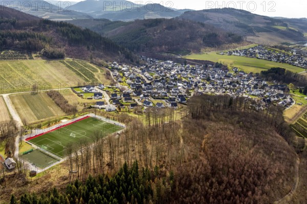 Aerial view, local view Bestwig, sports field Ostwig, Bestwig, North Rhine-Westphalia, Germany, mountains and valleys, DE, Europe, property tax, hilly landscape, real estate, aerial view, aerial photography, aerial photography, Sauerland, overview, bird's-eye view, forest area, living and life, residential area, birds-eyes view, overview