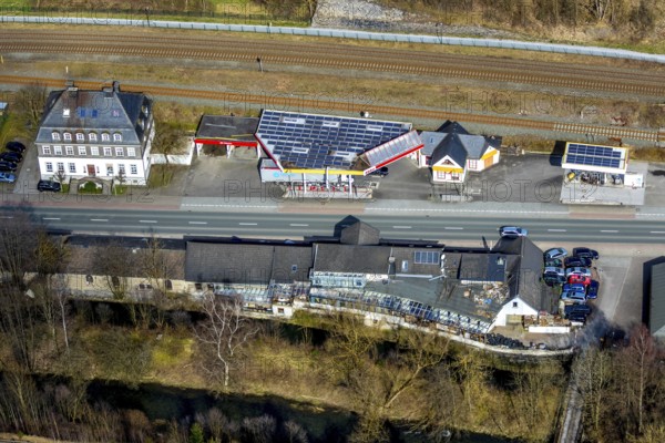Aerial view, petrol station Esso Nuttlar, federal road B7, river Ruhr, Bestwig, North Rhine-Westphalia, Germany, car dealership Top, railway tracks, DE, Europe, river Schormecke, aerial view, aerial photography, aerial photography, petrol station, overview, bird's-eye view, overview