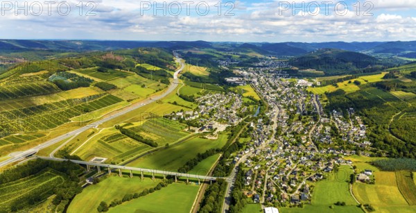 Aerial view, Ruhr valley bridge Velmede, valley bridge Schormecke, river Ruhr, motorway A46, view of Velmede and Borghausen in Bestwig, Sauerland, North Rhine-Westphalia, Germany, motorway bridge, Bestwig, bridge, DE, Europe, distant view, hilly landscape, aerial view, aerial photography, aerial photography, overview, bird's-eye view, forest area, meadows and fields, birds-eyes view, overview