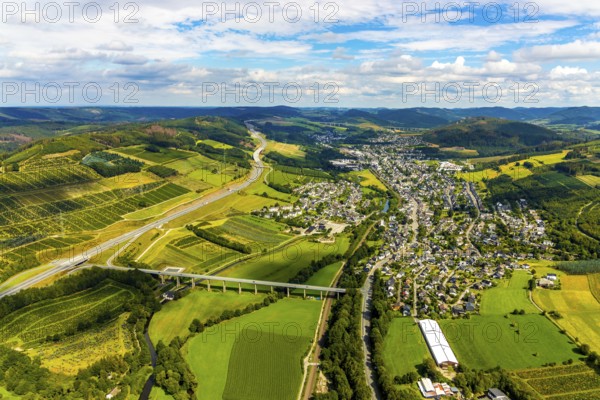 Aerial view, Ruhr valley bridge Velmede, valley bridge Schormecke, river Ruhr, motorway A46, view of Velmede and Borghausen in Bestwig, Sauerland, North Rhine-Westphalia, Germany, motorway bridge, Bestwig, bridge, DE, Europe, distant view, hilly landscape, aerial view, aerial photography, aerial photography, overview, bird's-eye view, forest area, meadows and fields, birds-eyes view, overview