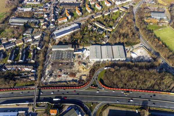 Aerial view, demolition of former factory halls Aquella Getränke Vertrieb, Berliner Straße, planned DIY store with garden centre, motorway A40, junction Wattenscheid-West, Leithe, Bochum, Ruhr area, North Rhine-Westphalia, Germany, demolition, demolition work, DE, Europe, aerial view, aerial photography, aerial photography, overview, bird's-eye view, planned DIY store, overview