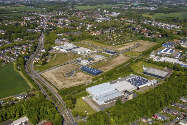 Aerial view, construction site, new industrial estate An der Salzstraße, district Hiltrop, Bochum, Ruhr area, North Rhine-Westphalia, Germany, railway tracks, BÄKO WEST eG, EnergieEffizienzZentrum Bochum, commercial area, commercial use, industrial area, industrial site, allotment garden site, allotment garden association, allotment garden association Friedlicher Nachbar Bochum-Gerthe, Lothringer Allee, aerial view, aerial photography, PATTBERG Maschinenbauteile GmbH, bird's eye view, birds-eyes view, overview, overview