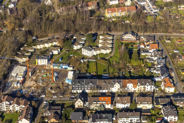 Aerial view, residential neighbourhood Am Beisenkamp, new construction with care facility, construction site, Wattenscheid, Bochum, Ruhr area, North Rhine-Westphalia, Germany, construction work, construction area, building site, building plots, construction crane, construction project, DE, development, Europe, property tax, real estate, capacity requirements, aerial view, aerial photography, aerial photography, multigenerational neighbourhood, terraced houses, overview, bird's-eye view, residential complex, living and living, residential area, residential buildings, residential quality, residential quarter, housing estate, birds-eyes view, overview