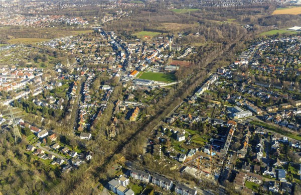 Aerial view, planned cycle path on former railway line, local view Günnigfeld, road subway Parkstraße Aschenbruch, Günnigfeld, Bochum, Ruhr area, North Rhine-Westphalia, Germany, railway tracks, DE, Europe, property tax, real estate, Herz Mariä church, aerial view, aerial photography, aerial photography, VfB Günnigfeld sports ground, tunnel, overview, subway, residential complex, living and life, residential area, residential buildings, housing estate, housing estate bird's eye view, birds-eyes view, overview