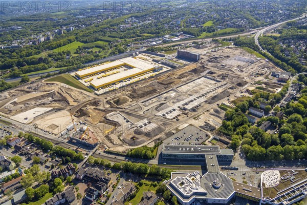 Aerial view, new construction DHL logistics parcel centre, former Opel site, former Opel administration building, Laer district, Bochum, Ruhr area, North Rhine-Westphalia, Germany, expansion areas, A448 motorway, construction, construction area, construction site, construction project, construction site, DE, DHL, DHL logistics, DHL parcel centre, earthworks, Renewal, development, Europe, distant view, Mark 51/7 industrial estate, capacity requirements, logistics, aerial view, aerial photography, aerial photography, new build, Opel site, Opelring 1, overview, bird's-eye view, growth, becoming and growing, birds-eyes view, former Opel site with old administration building, overview