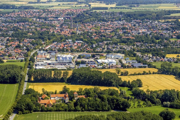 Aerial view, Haus Hameren, former moated castle, view of the town, Friethöfer Kamp industrial estate, St. Ludgerus Billerbeck Cathedral, parish church St. Johann, Billerbeck, Münsterland, North Rhine-Westphalia, Germany, Alstätte, architectural monument, castle, castle complex, DE, monument protection, Europe, property tax, manor house, manor building, courtyard complex, real estate, aerial photograph, aerial photography, aerial photography, castle, castle complex, townscape, urban area, overview, defence system, bird's eye view, living and life, residential area, residential buildings, quality of life, birds-eyes view, overview