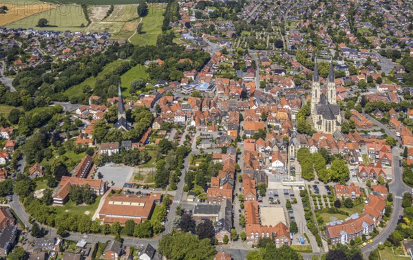 Aerial view, Dom St. Ludgerus Billerbeck, parish church St. Johann, town centre, Billerbeck, Münsterland, North Rhine-Westphalia, Germany, place of worship, DE, cathedral, Domgasse, Europe, religious community, property tax, hall church, holy place, real estate, catholic church, cathedral, church, parish, denomination, aerial view, aerial photography, aerial view of the town centre, Billerbeck, Münsterland, North Rhine-Westphalia, Germany. pilgrimage church, cathedral, church, parish, denomination, aerial view, aerial photography, aerial photography, local view, Propsteikirche St. Ludgerus, transept, religion, religious site, townscape, city centre, overview, bird's-eye view, landmark, residential area, living and life, residential area, residential buildings, quality of life, housing estate, birds-eyes view, historical, overview