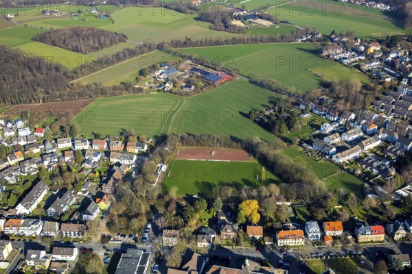 Aerial view, Am Hillerberg sports ground, Ballspielverein Hiltrop 1912 e.V., Landwirtschaftlicher Betrieb Heiermann Ferkelaufzucht KG, Gerther Straße, Bochum, Ruhr area, North Rhine-Westphalia, Germany, Am Hillerberg, DE, Europe, piglet breeding, football pitch, football club, property tax, real estate, agricultural business, farm, aerial view, aerial photography, aerial photography, sports, sports facilities, sports field, sports facility, animal breeding, overview, bird's-eye view, meadows and fields, housing and living, residential area, residential buildings, housing quality, residential neighbourhood, housing estate, birds-eyes view, overview