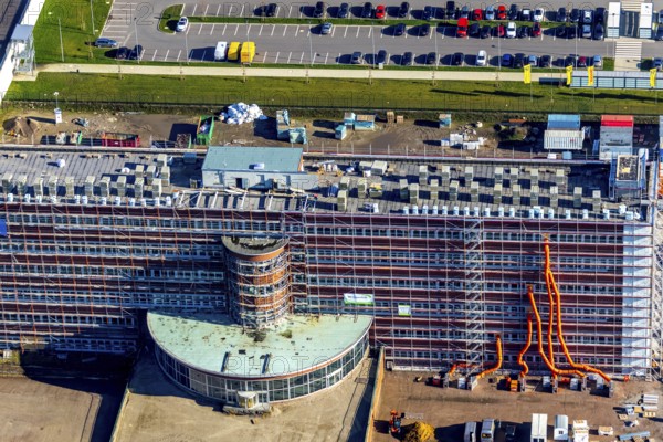 Aerial view, MARK 51Â°7 industrial estate, former Opel site with old administration building, Laer, Bochum, Ruhr area, North Rhine-Westphalia, Germany, expansion areas, construction, construction area, construction site, construction project, construction site, DEU, monument protection, earthworks, renewal, development, Europe, Mark 51/7 industrial estate, capacity requirements, logistics, aerial view, aerial photography, aerial photography, new build, Opel site, Opelring 1, overview, administration, bird's-eye view, growth, becoming and growing, birds-eyes view, overview
