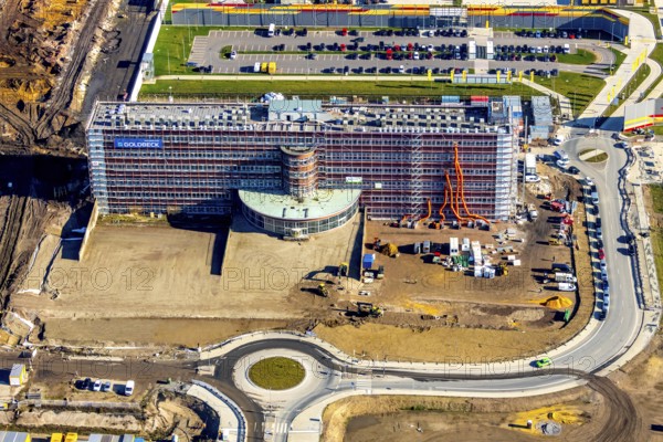 Aerial view, MARK 51°7 industrial estate, former Opel site with old administration building, Laer, Bochum, Ruhr area, North Rhine-Westphalia, Germany, expansion areas, construction, construction area, construction site, construction project, construction site, DEU, monument protection, earthworks, renewal, development, Europe, Mark 51/7 industrial estate, capacity requirements, roundabout, logistics, aerial view, aerial photography, aerial photography, new build, Opel site, Opelring 1, overview, administration, bird's-eye view, growth, becoming and growing, birds-eyes view, overview