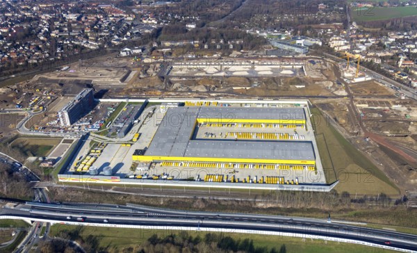 Aerial view, MARK 51Â°7 industrial estate, new construction DHL logistics parcel centre, former Opel site, Laer district, Bochum, Ruhr area, North Rhine-Westphalia, Germany, expansion areas, A448 motorway, construction, construction area, construction site, construction project, construction site, DEU, DHL, DHL logistics, DHL parcel centre, earthworks, Renewal, development, Europe, Mark 51/7 industrial estate, capacity requirements, logistics, aerial view, aerial photography, aerial photography, new build, Opel site, Opelring 1, overview, bird's-eye view, growth, becoming and growing, birds-eyes view, former Opel site with old administration building, overview